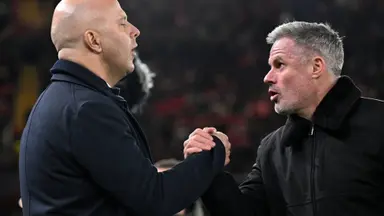 Jamie Carragher Manchester City: Jamie Carragher shaking hands with Arne Slot during a broadcast appearance.