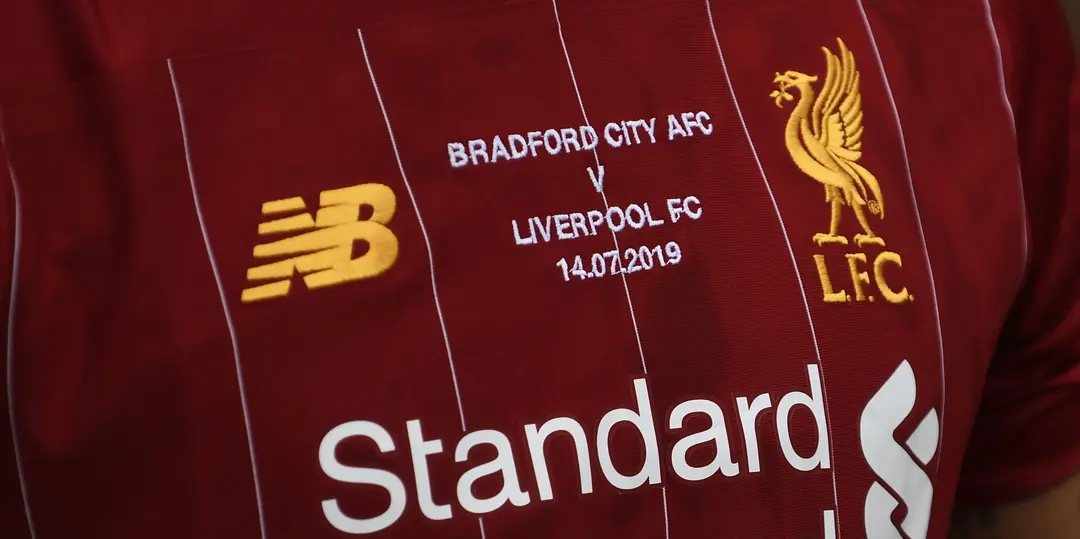 New Balance continue fight over Liverpool kit deal