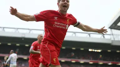 Shelvey tribute to Gerrard: Steven Gerrard celebrating in a Liverpool kit during a match at Anfield.
